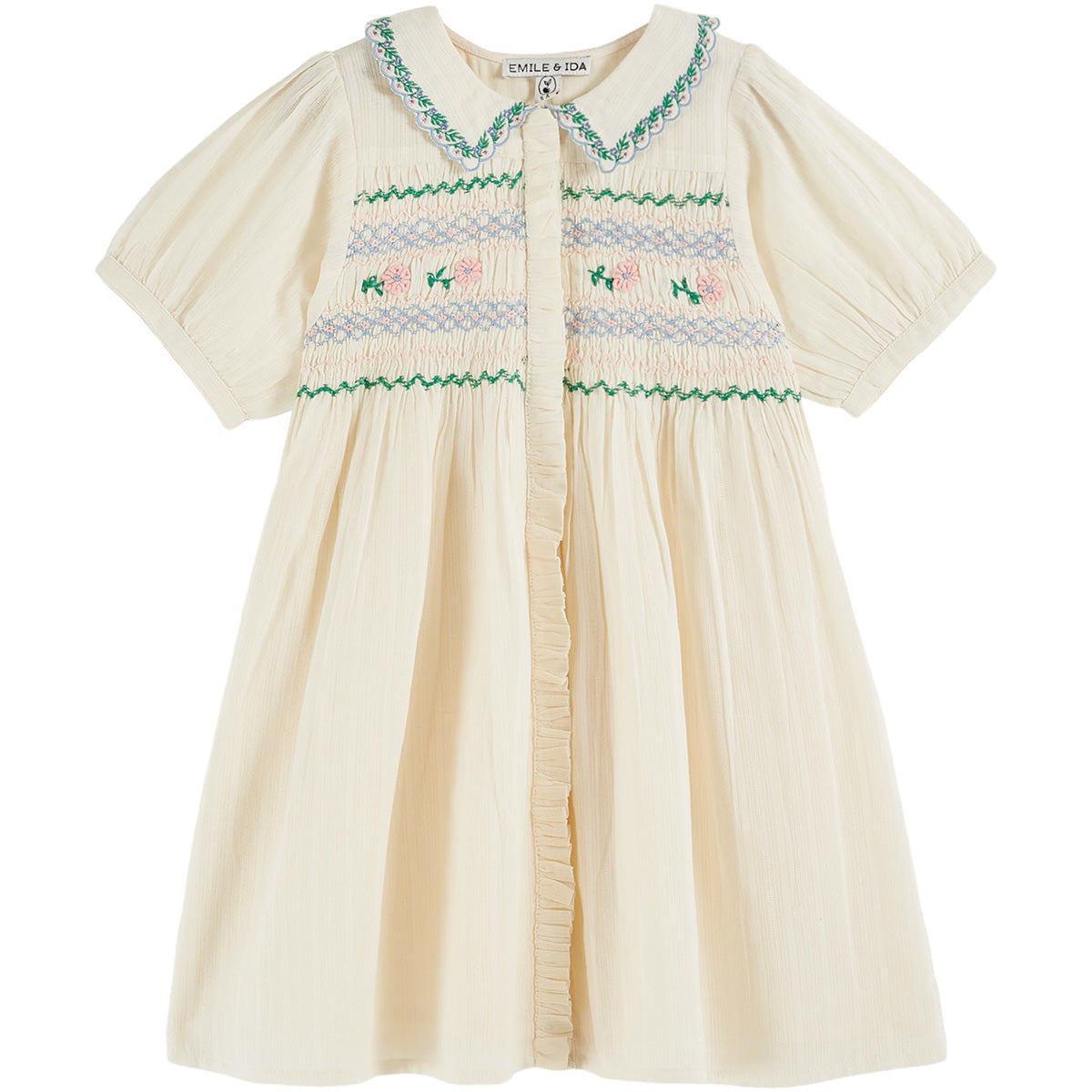 Hand Smocked Embroidered Dress by Emile et Ida. Featuring delicate smocking, floral embroidery, scalloped collar.