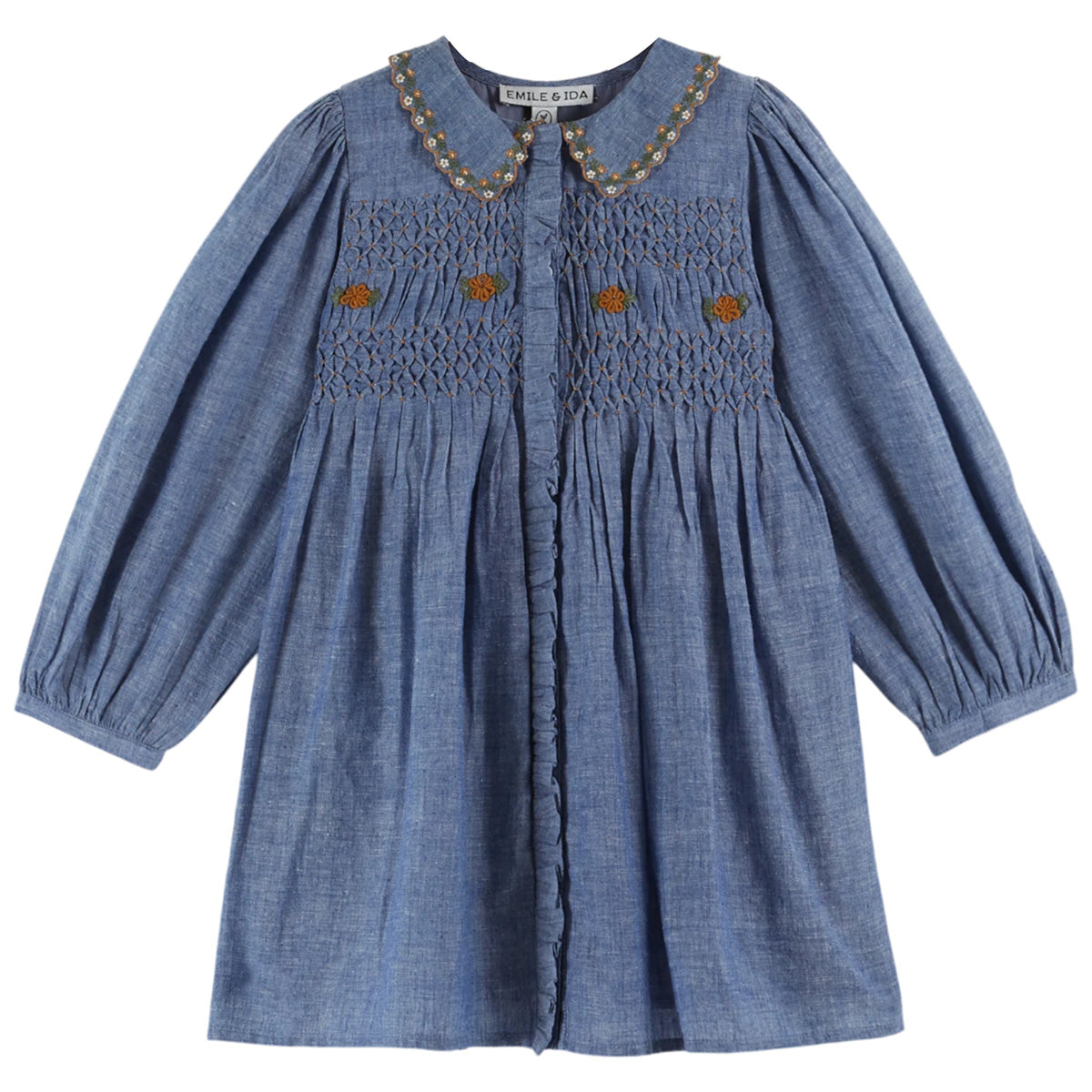The Chambray Smocked Dress from Emile et Ida. Blue cotton chambray smocked dress.