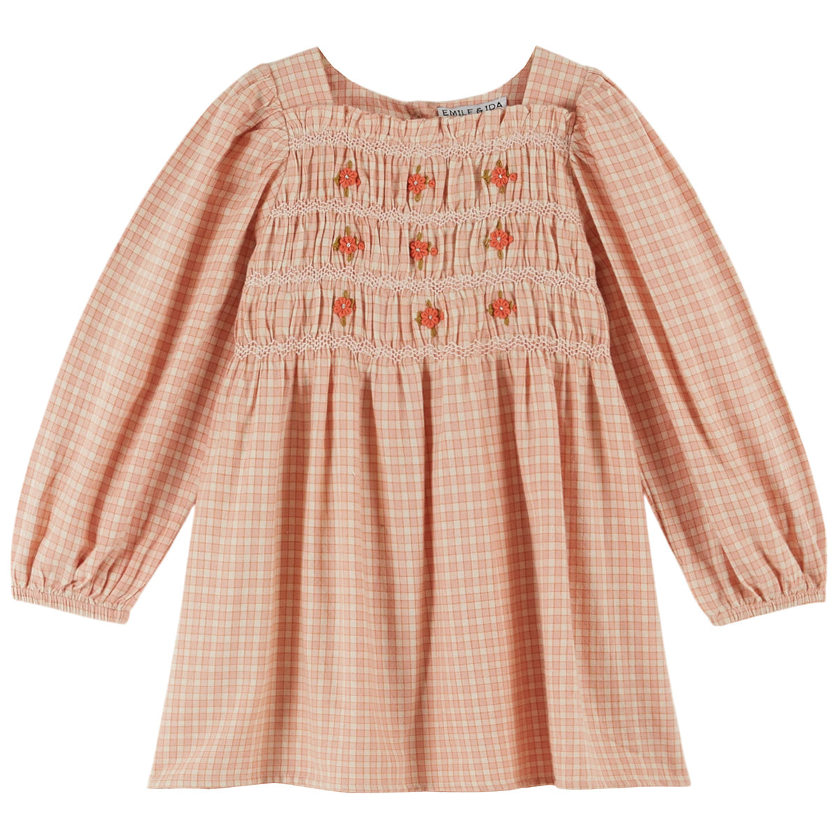 The Pink Check Smocked Dress from Emile et Ida. Cotton dress with pink and white checks surrounded by fine orange lines. 
