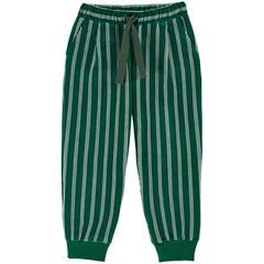 The Striped Velvet Jogger from Emile et Ida. Jogger in cotton and polyester velvet with white stripes on a green background.