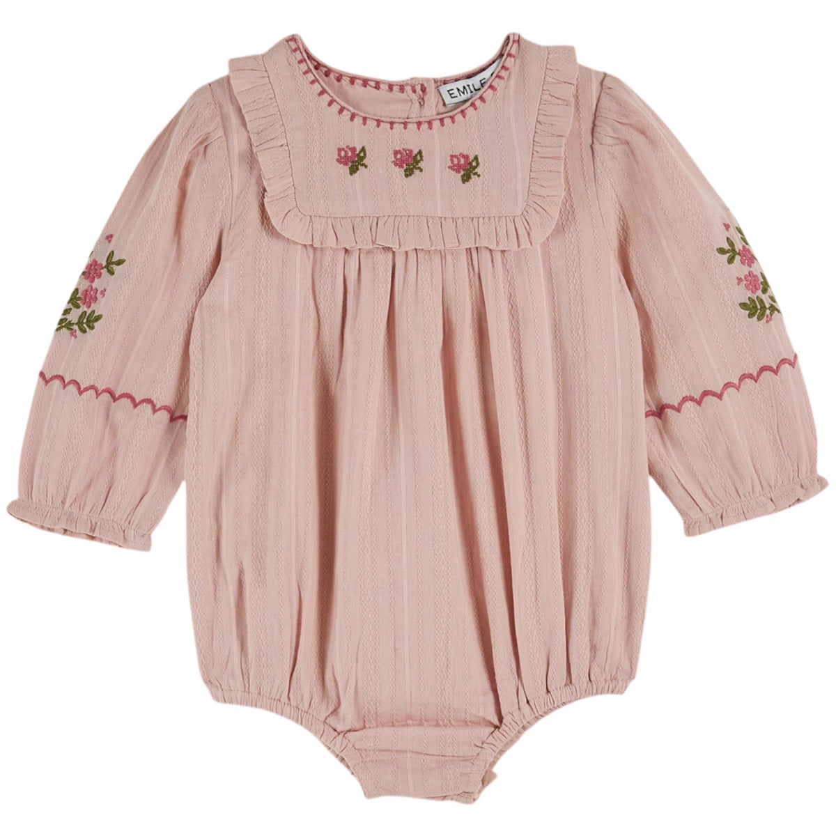 The Floral Embroidered Romper from Emile et Ida. Pink baby romper with floral embroidery.