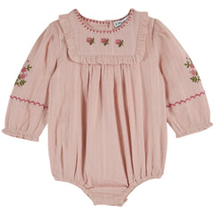 The Floral Embroidered Romper from Emile et Ida. Pink baby romper with floral embroidery.