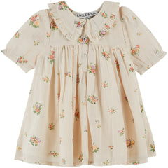 Wide Printed Dress by Emile et Ida in cream with delicate floral print, ruffled collar, short sleeves, and front buttons.