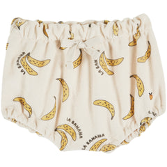 The All Over Printed Bloomer from Emile et Ida, baby bloomer with banana print, elastic waist, and gathered leg openings.