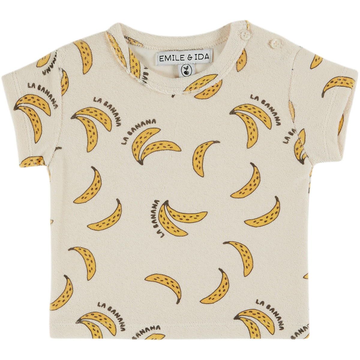 The Terry Tee Shirt from Emile et Ida, baby tee with banana print, short sleeves, and shoulder button closure.