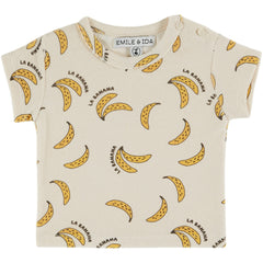 The Terry Tee Shirt from Emile et Ida, baby tee with banana print, short sleeves, and shoulder button closure.