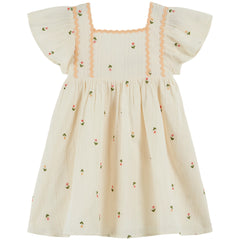 All Over Embroidered Dress by Emile et Ida in cream with floral embroidery, flutter sleeves, and scalloped trim detail.