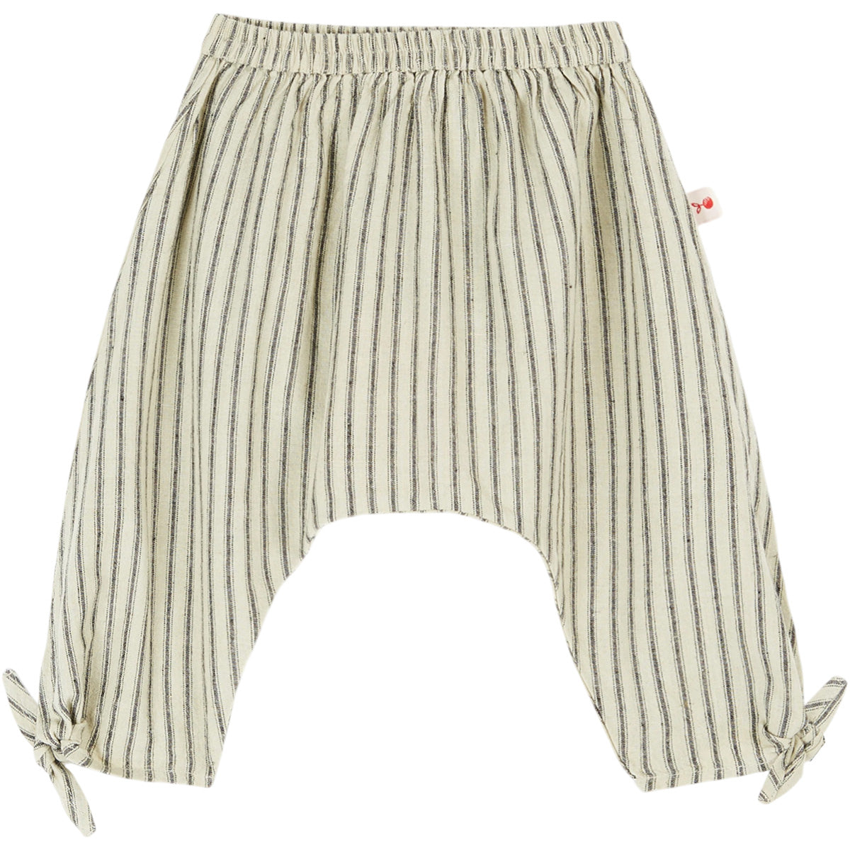 The Sirwal Baby Pants from Emile et Ida, striped baby pants with elastic waistband and ankle tie details.