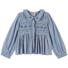 Smocked Blouse by Emile et Ida with hand-smocked bodice, ruffled Peter Pan collar and embroidered cherries.