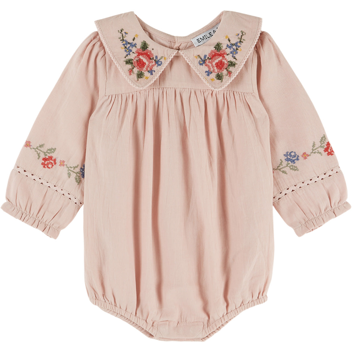 Cross Stitch Romper by Emile et Ida pink baby romper with embroidered Peter Pan collar and floral sleeve details