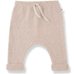 Alain Pants by 1+ in the Family in beige with drawstring waist and rolled cuffs.