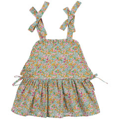 The Andreas Top from The New Society is a delightful piece featuring elegant front ruffles and a unique cut.