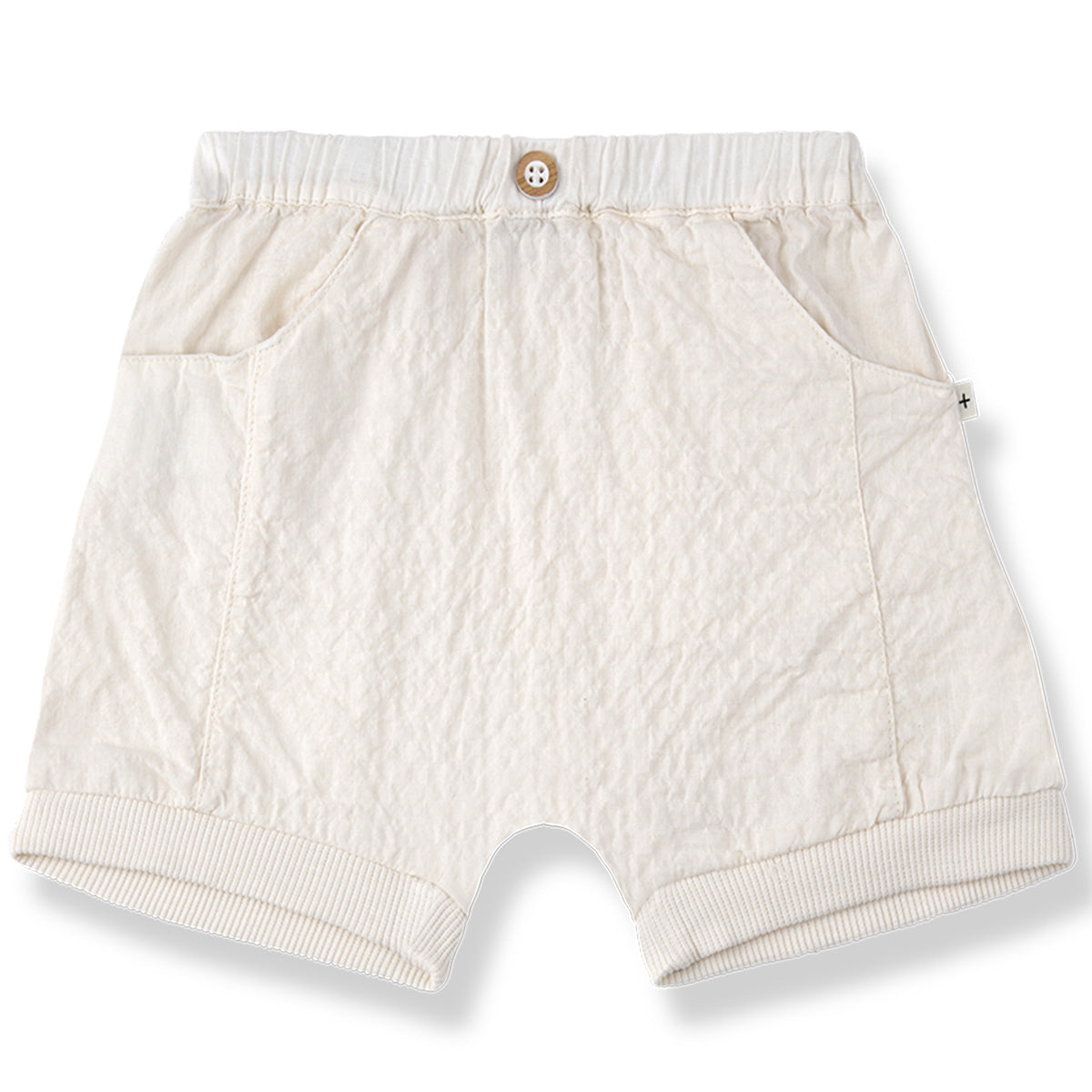 The Argos Bermuda from 1+ in the Family, textured baby shorts with an elastic waistband, button detail, and side pockets.