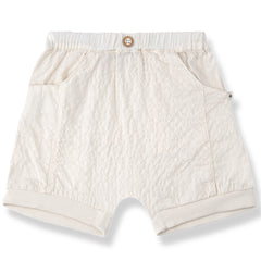 The Argos Bermuda from 1+ in the Family, textured baby shorts with an elastic waistband, button detail, and side pockets.