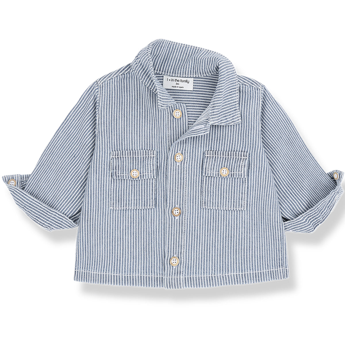The Arta Shirt from 1+ in the Family in striped denim with front buttons and chest flap pockets.