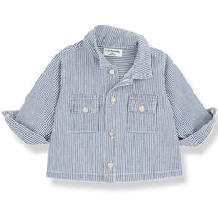 The Arta Shirt from 1+ in the Family in striped denim with front buttons and chest flap pockets.