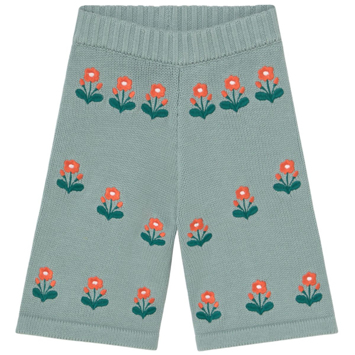The Flowers Baby Knitted Pant from Tiny Cottons. Green knitted pants with red floral patterns on a white background.
