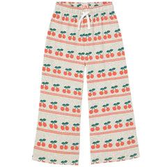The Cherry Pattern Rib Pant from Tiny Cottons. Pants with elasticated waist, drawstring, and cherry pattern.