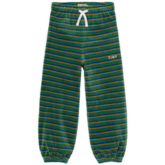 The Duo Stripes Sweatpants from Tiny Cottons. Green velour sweatpants with horizontal stripes in blue and mustard.
