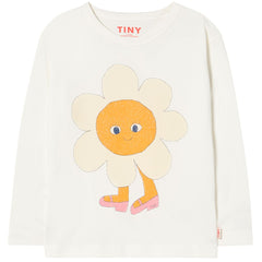 The Flower Graphic Sleeve Tee from Tiny Cottons. White sweater with a smiling flower design.