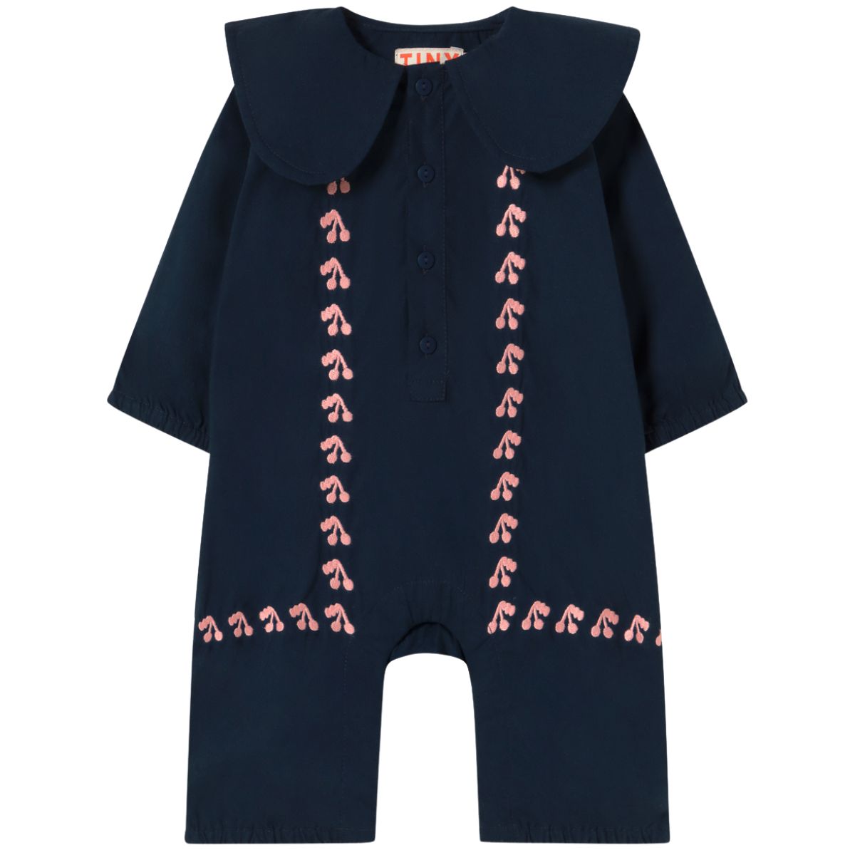 The Mini Cherries One piece from Tiny Cottons. Navy blue baby romper with pink embroidery on a white background.