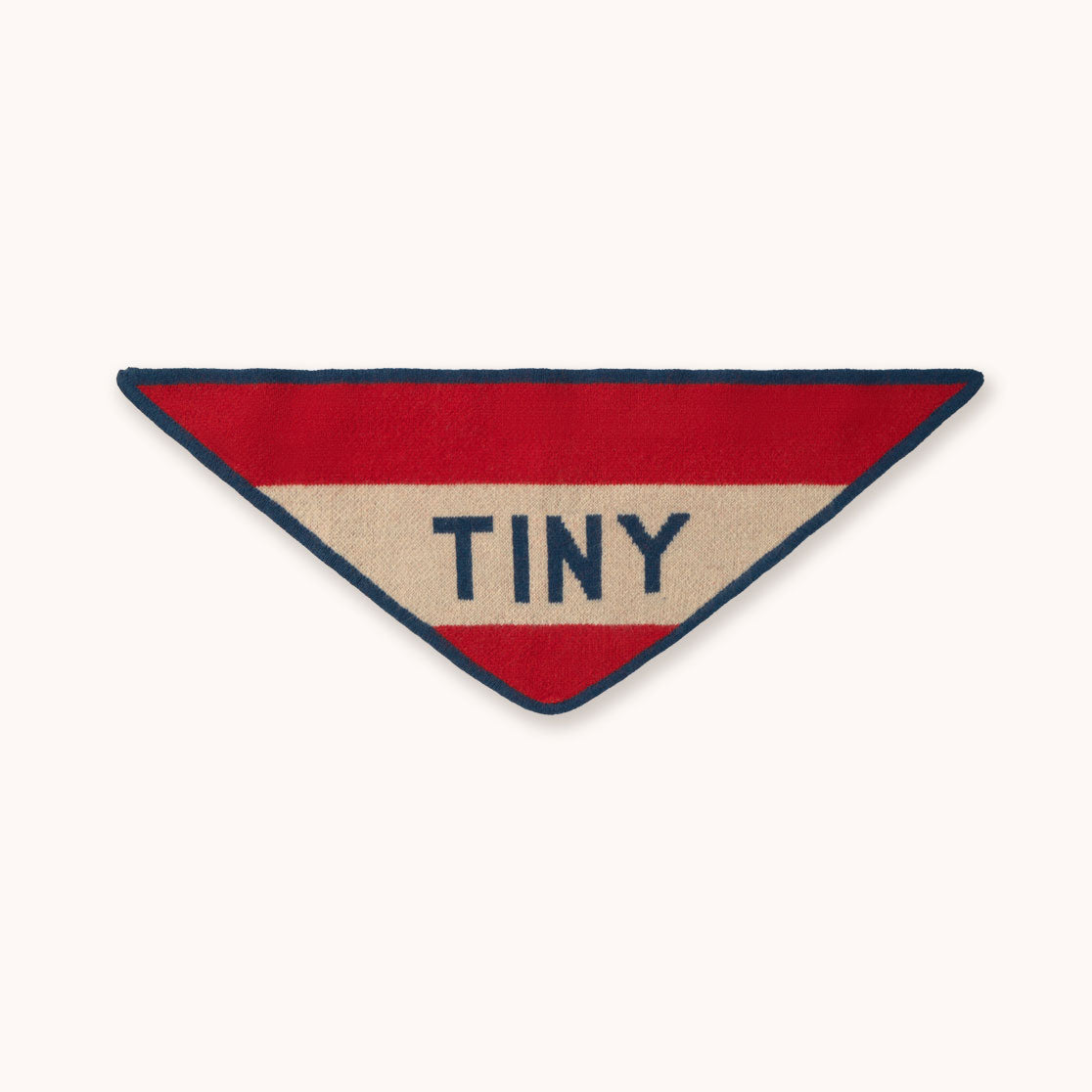 A bandana by designer Tiny Cottons - a triangular patch with horizontal red and beige stripes, outlined in navy blue, with the word 'TINY' in navy text across the center, shown on a plain off-white background.