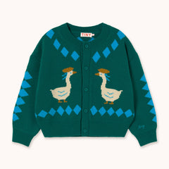 A dark green knit cardigan sweater by designer Tiny Cottons featuring two cream-colored geese with brown hats and blue accents, set against a light cream background.