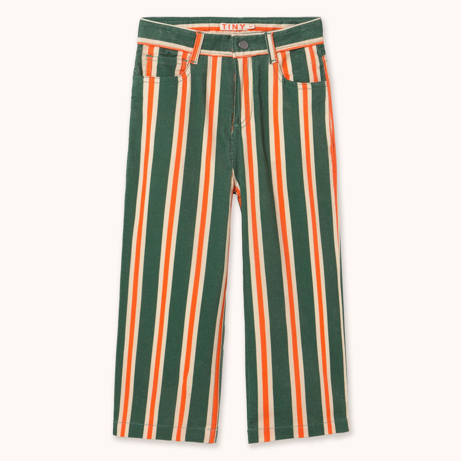 A pair of wide-leg cropped pants featuring vertical stripes in forest green, orange, and off-white, by designer Tiny Cottons, laid flat against a light cream background.