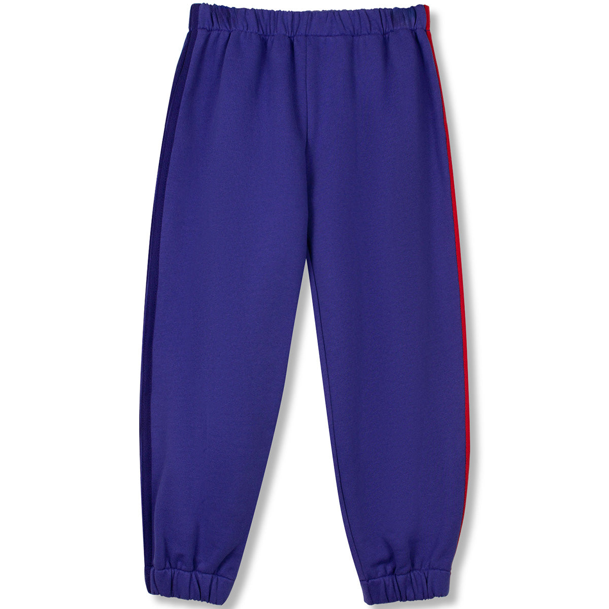 The Studio Pants from Wynken, cobalt blue jogger pants with contrast side stripes and elastic cuffs.