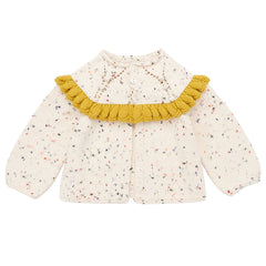 The Ruffle Cardigan from Misha & Puff. Knitted cardigan with multicolor specks and a delightful mustard ruffle accent