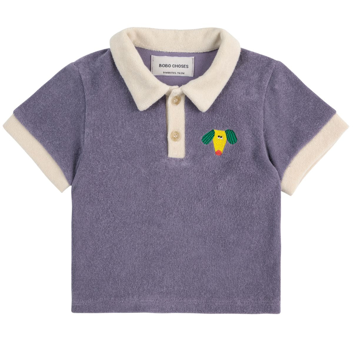 Happy Dog Terry Cloth Polo from Bobo Choses. This navy blue t-shirt is a classic reimagined for modern adventures.