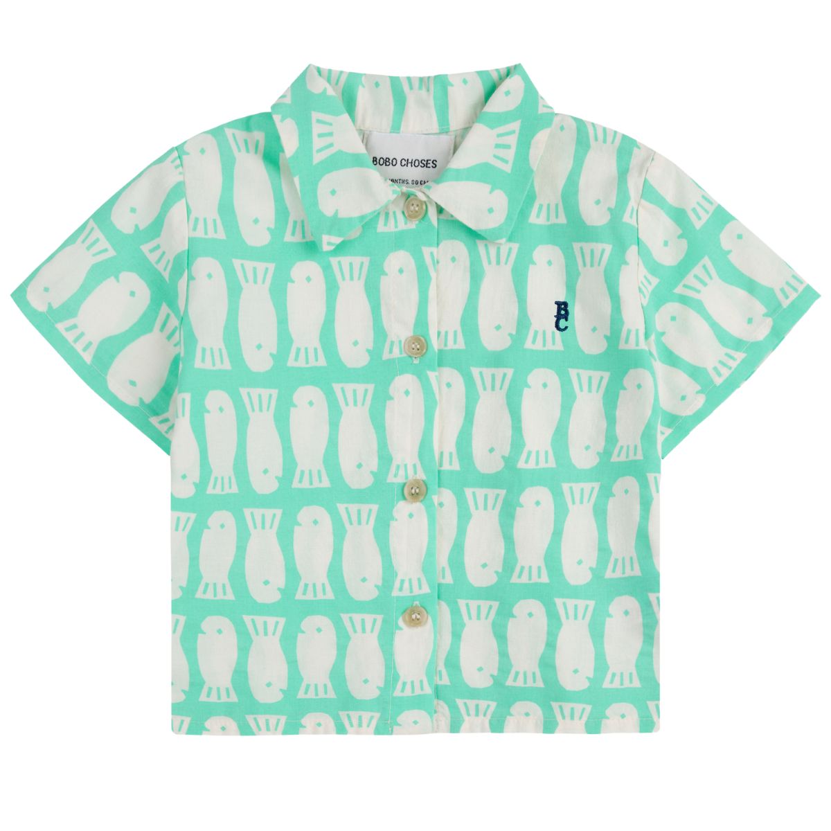 Lucky Fish All Over Woven Shirt from Bobo Choses. Fresh and timeless, this light green shirt is made for curious little ones.