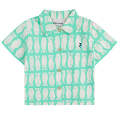 Lucky Fish All Over Woven Shirt from Bobo Choses. Fresh and timeless, this light green shirt is made for curious little ones.
