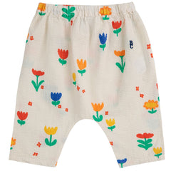 Garden Party All Over Woven Harem Pants from Bobo Choses feature a baggy fit, an elasticated waistband, adjustable drawstring.
