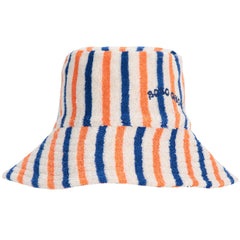 Bobo Choses Stripes Terry Cloth Bucket Hat from Bobo Choses. Striped bucket hat features bold orange and blue stripes.