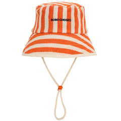 The Bobo Choses Striped Bucket Hat from Bobo Choses. Add a pop of color to your outfit with this orange hat.