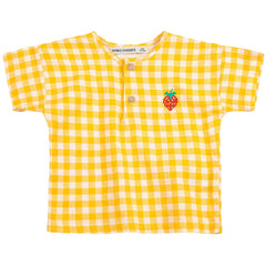 Pixel Strawberry Vichy Woven Blouse by Bobo Choses in yellow gingham fabric with front buttons and pixel strawberry embroidery.