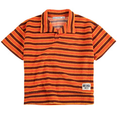 The Striped Brick Terry Cloth Polo from Bobo Choses. Orange t-shirt. Designed with short sleeves, polo neck.