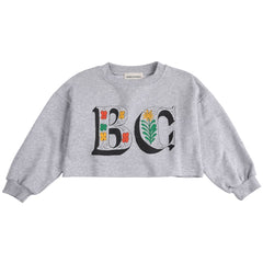 The Spring Letters Cropped Sweatshirt by Bobo Choses, grey cropped sweatshirt with colorful BC floral lettering on the front.