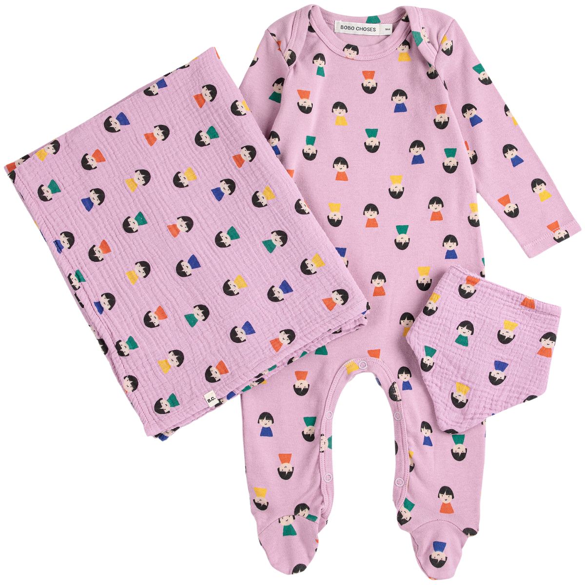 Game Pawn All Over Gift Set by Bobo Choses with pink romper, envelope neck, and blanket featuring colorful character pattern.