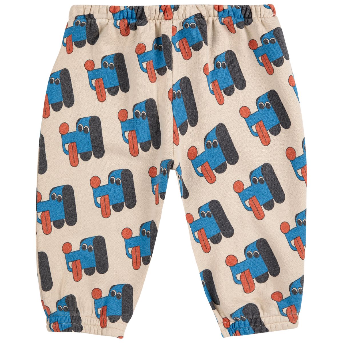 The Doggy Mate All Over Jogging Pants from Bobo Choses with blue and black doggy pattern on a beige background.