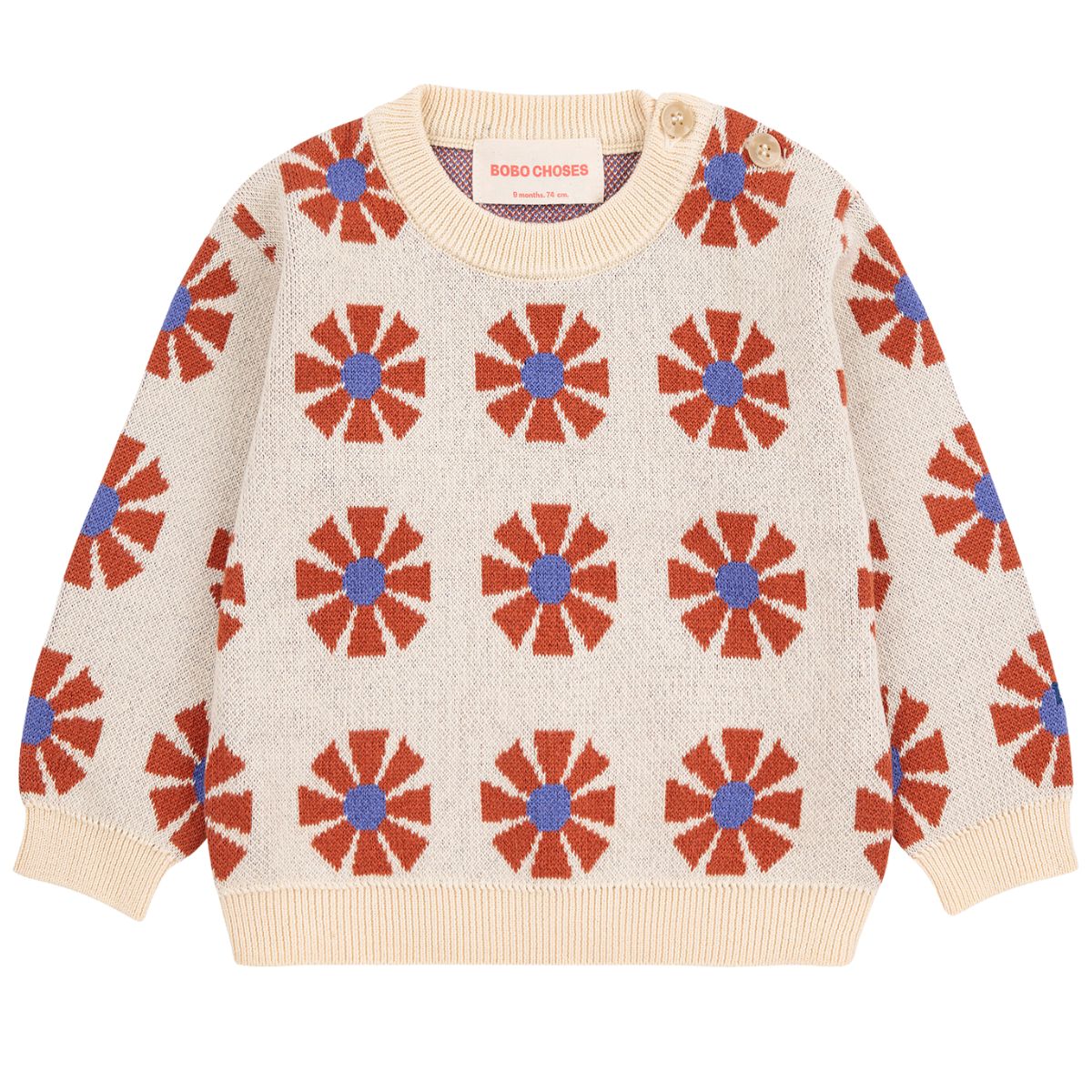 The Kaleidoscope All Over Jacquard Sweater from Bobo Choses with red and blue floral pattern.