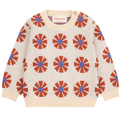 The Kaleidoscope All Over Jacquard Sweater from Bobo Choses with red and blue floral pattern.