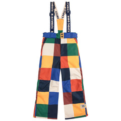 The Multicolor Tiles Ski Pants from Bobo Choses. Colorful checkered ski pants with suspenders.