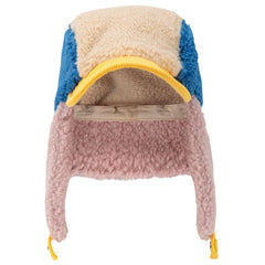 The Bobo Choses Color Block Sheepskin Chapka from Bobo Choses. Color-block shearling trapper hat with ear flaps.