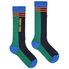 The Bobo Choses Ski Long Socks from Bobo Choses. Kids’ socks with a bold color-block pattern, striped cuffs.