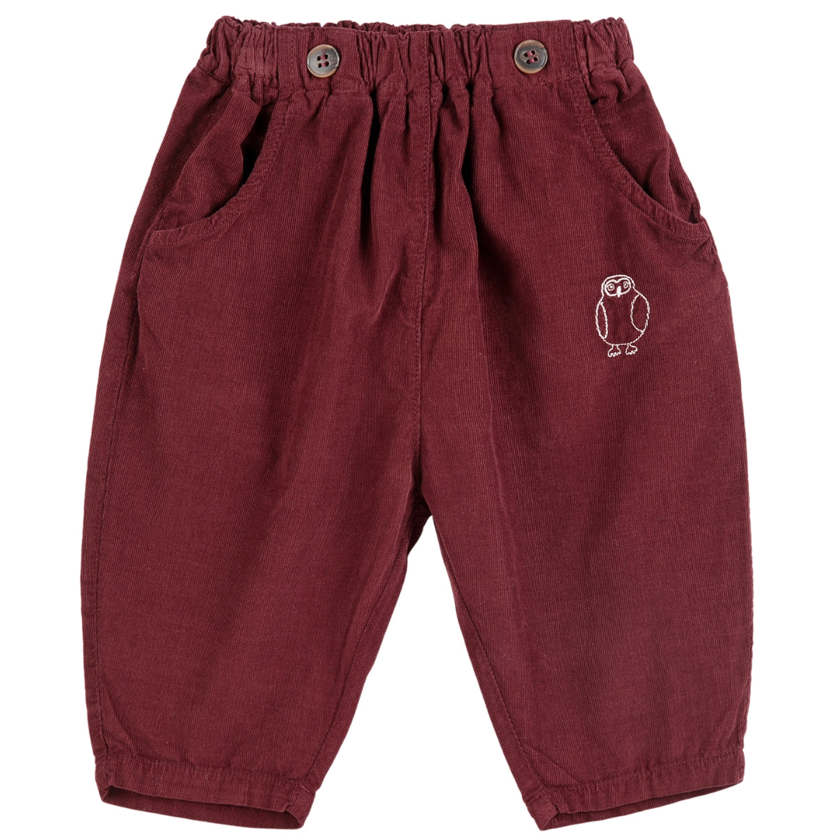 The Curious Owl Corduroy Pants from Bobo Choses in burgundy with an elastic waist, front buttons, and embroidered owl.