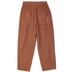 The Quilted Jogging Pants from Bobo Choses featuring a vertically quilted texture, front patch pockets, and logo details.