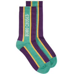 The Bobo Choses Embossed Extralong Socks in purple and teal green featuring yellow vertical stripes and white branding.