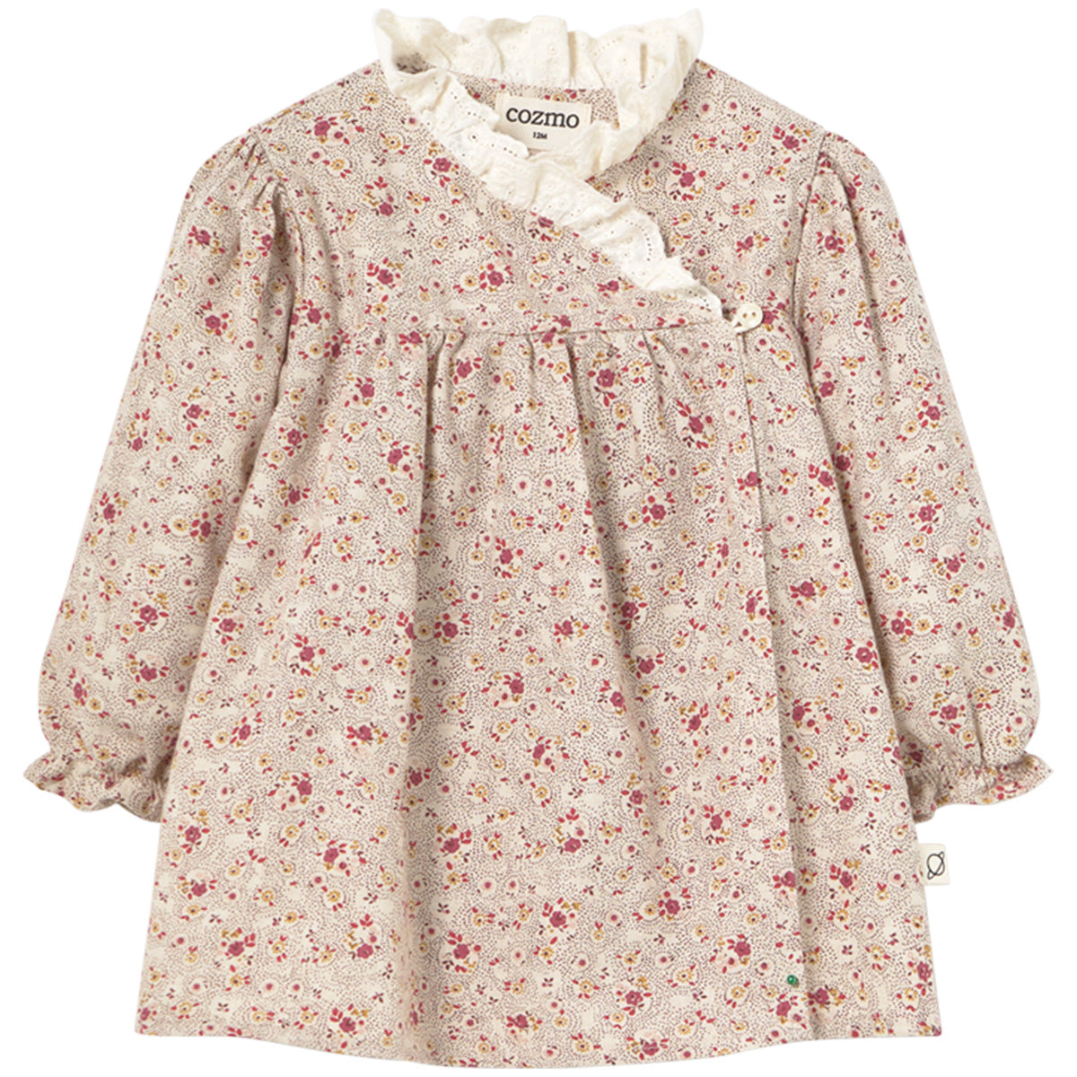The Berna Dress from Cozmo. Soft flannel dress for baby girls, featuring a delicate floral pattern.